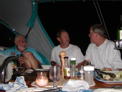 Ron, Dave, and Chip relax after our arrival dinner