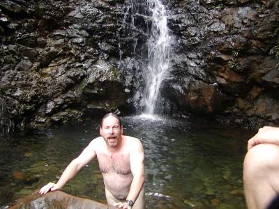 Bradley skinny dips at the waterfall