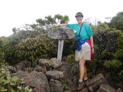Kathy at the summit of Mt. Bouo in the Mt Khogis range