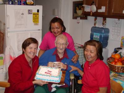 Jack on his 97th birthday with Kathy, stepdaughter Francesca, and wife Virginia