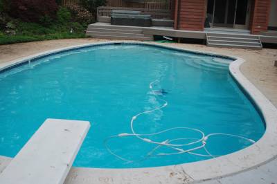 Pool after re-surfacing, re-plumbing, and re-filling