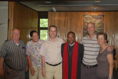 The Clark siblings with Reverend John from Davies Memorial UUC