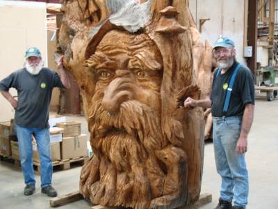 Kauri sculpture with Alby Hall, artist who designed our plate, on right